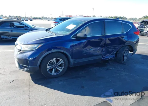 2017 Honda Cr-V Lx z USA, uszkodzony, nr VIN 7FARW5H36HE003679